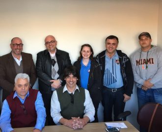 Representantes de coligações em reunião na Criativa FM