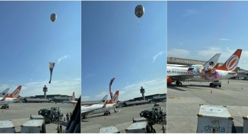 Balão cai em aeroporto e parte dele fica em cima de avião da Gol em Guarulhos, na Grande SP; veja vídeo